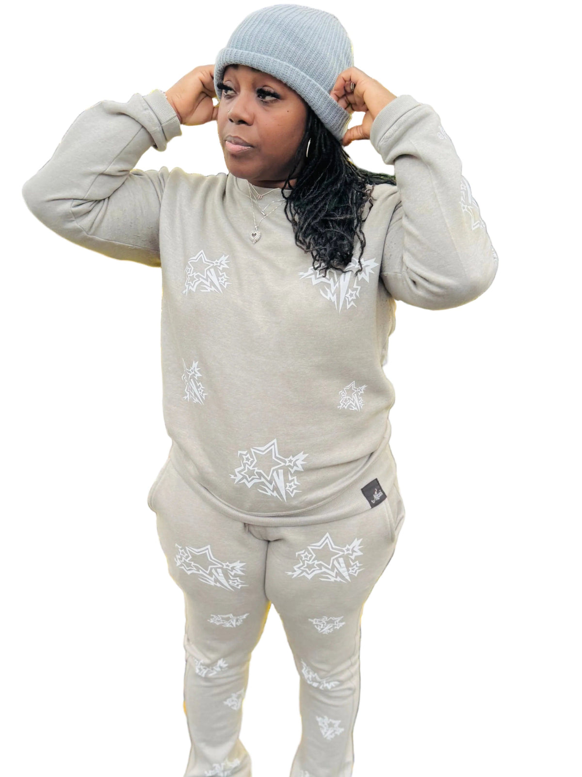 Green cotton sweatsuit with star puff all over.